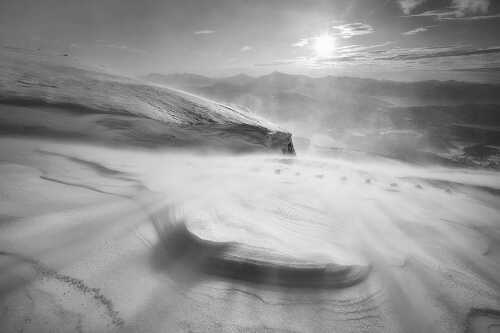 Black and white photo of snow landscape