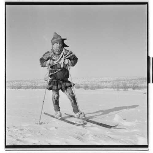 Unknown Sami man skiing